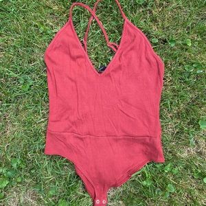 Red low cut bodysuit
